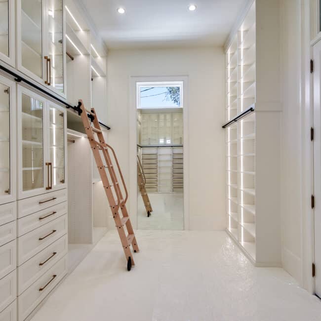 white custom built master closet in Louisisana